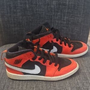 Nike Black and Red High-Top Sneakers with Classic Design